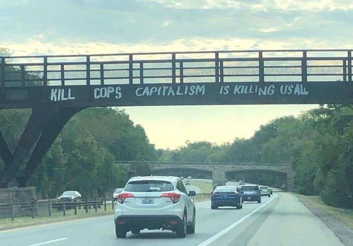 KILL COPS GRAFFITTI ON I-64 - 9-21-19 - COURTESY METRO COUNCIL DEMOCRATIC CAUCUS ON FACEBOOK.jpg