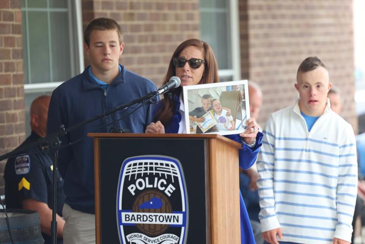 Amy Brown, widow of Jason Ellis, and her sons.JPG