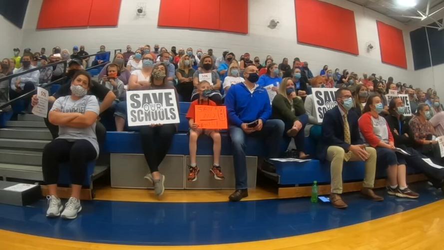 Parents and students attend a community meeting at Bloomfield Elementary