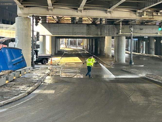 Man sprays River Road on Feb. 24, 2025.jpg
