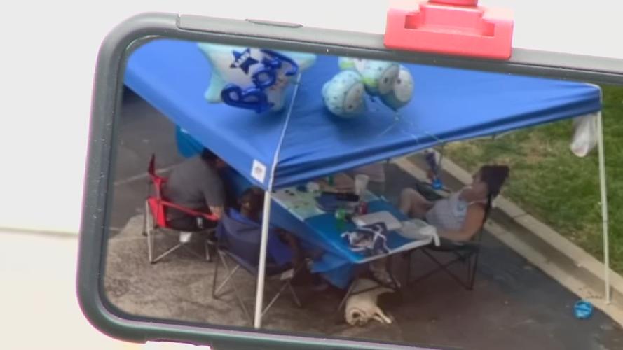 Family camps outside of Norton Hospital during pandemic to welcome baby