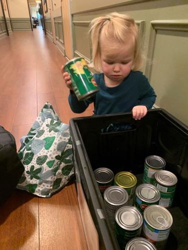 Louisville preschools donating canned goods.jpg