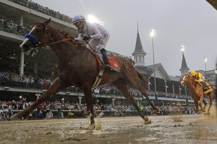 DERBY 144-JUSTIFY CROSSES FINISH LINE-AP.jpeg