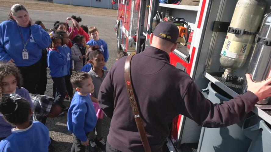 Shively firefighters surprise Cane Run Elementary students 2-23-24