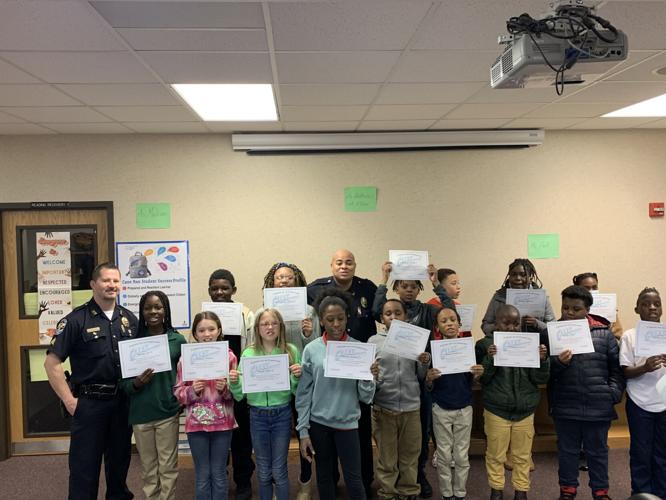 LMPD officers and Cane Run Elementary students take part in G.R.E.A.T. gang avoidance program