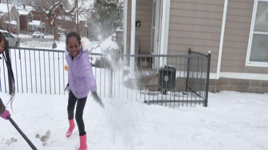 Kids play in the snow in Louisville 1-7-25