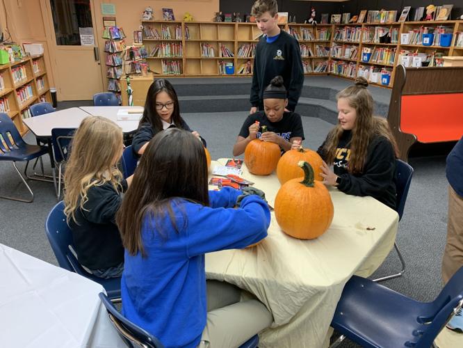 Jack O Lantern Stroll - Students at Table.jpeg