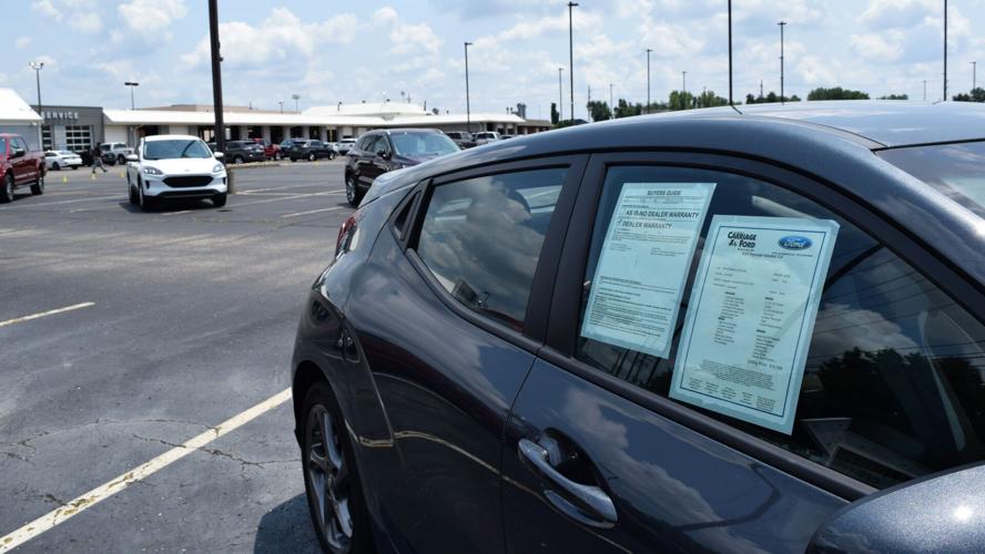 Carriage Ford new car on lot.JPG