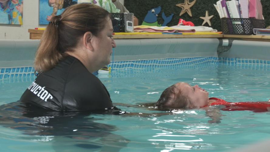 A young student goes through lessons with ISR instructor, Michele Mattix