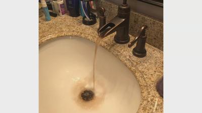 Charlestown residents hold their own meeting, frustrated about brown water