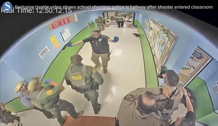 Police in hallway at Robb Elementary School in Uvalde, Texas