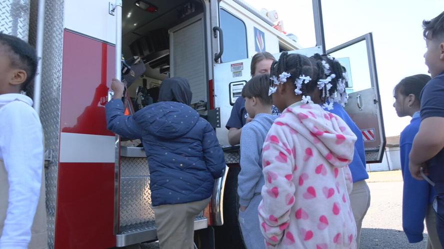 Shively firefighters surprise Cane Run Elementary students 2-23-24