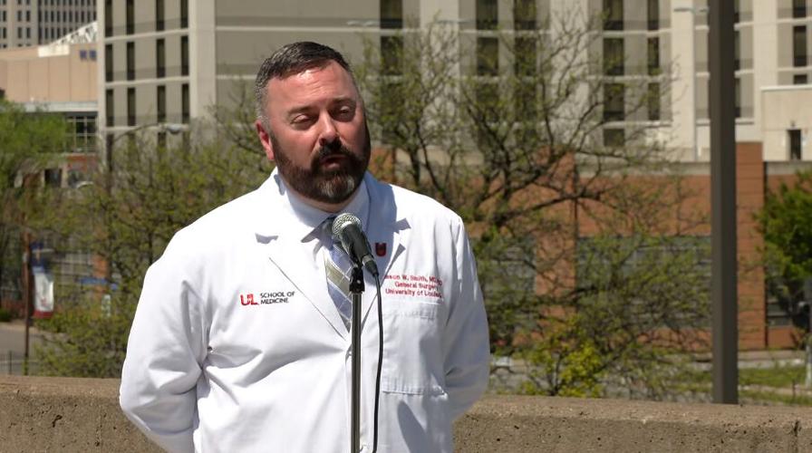 Dr. Jason Smith of UofL Health holds a news conference on April 12, 2023