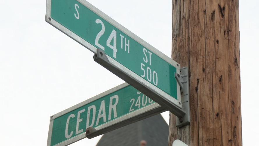 24th and Cedar Streets street signs - 10.11.23