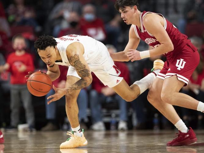 Nebraska's Trey McGowens recovers a loose ball against Indiana's Trey Galloway.jpeg