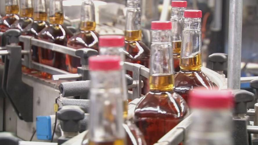 bourbon bottles on manufacturing line