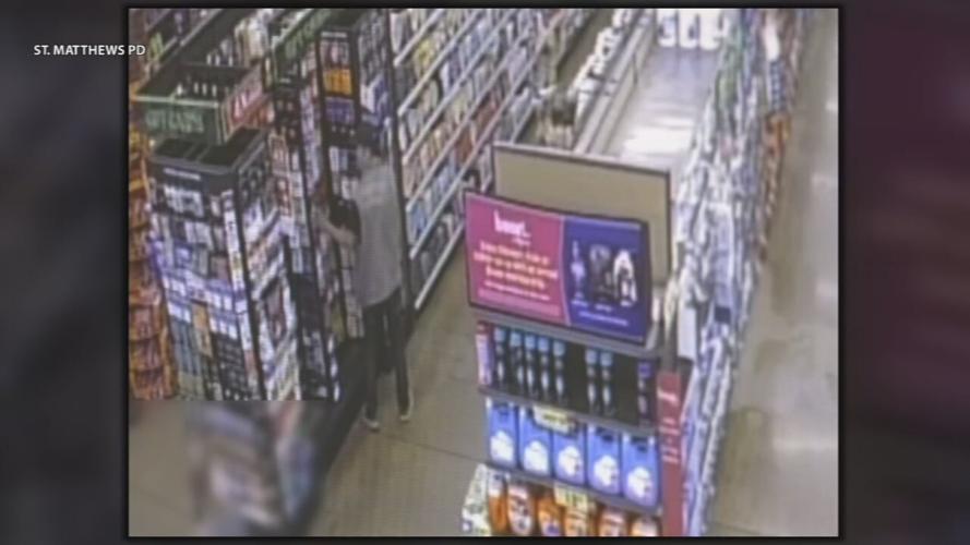 Person shoplifting gift cards