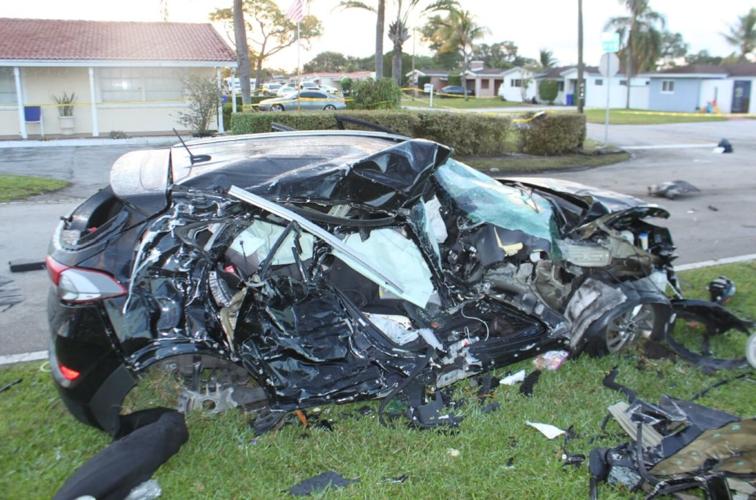 The passenger side of Bishop's car after it was hit by the small aircraft..jpg