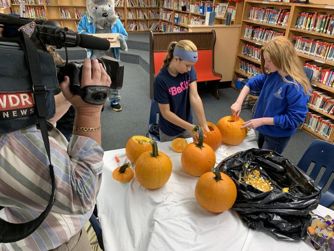 Jack O Lantern Stroll - Students Carve as WDRB camera films.jpeg