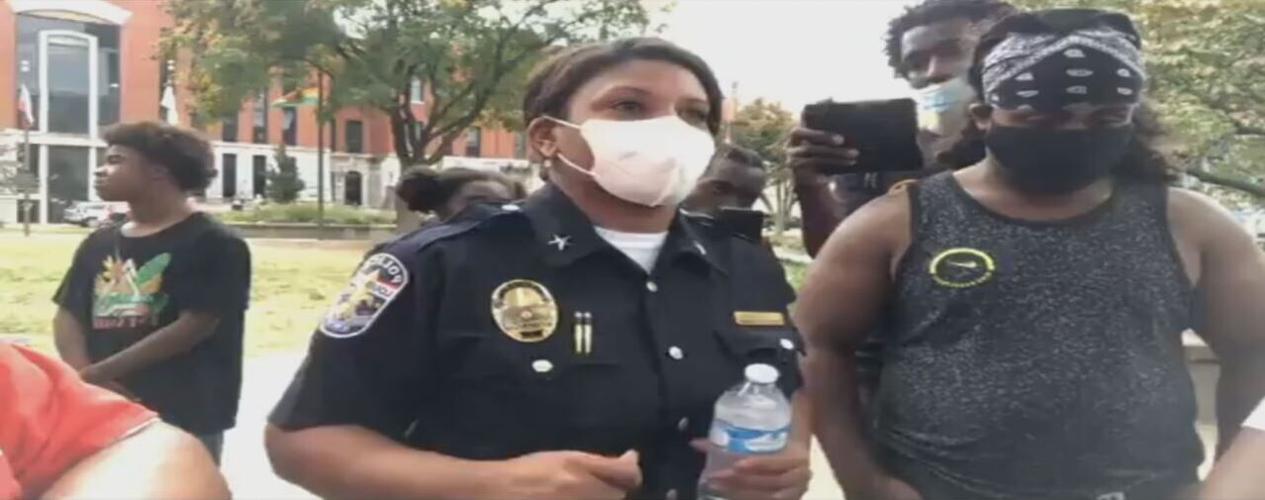 Gentry with Protesters.jpeg