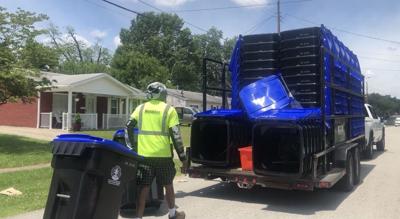 Public Works replaces small orange bins with new recycling containers
