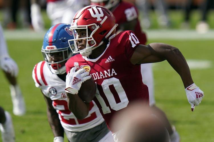Indiana running back David Ellis (10) runs away from Mississippi defensive