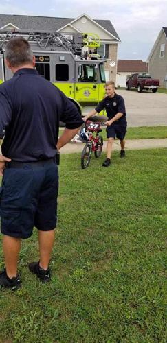 Shepherdsville Fire Department gives boy new bike (Aug. 27, 2019)