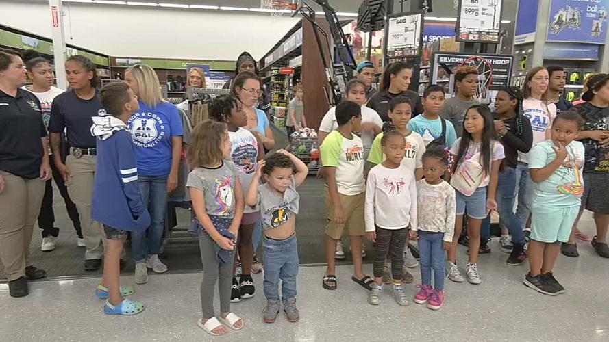 Police take Louisville-area kids on shopping spree at Academy Sports
