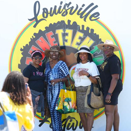 People pose for a photo at Louisville Juneteenth Festival.JPG
