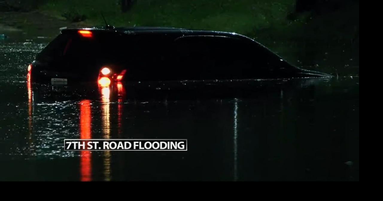 Flooding, wind cause rescues, road closures and tree damage in ...