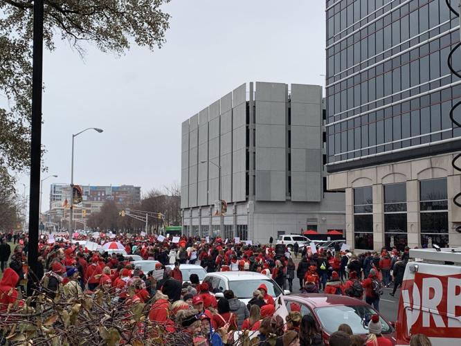 GO RED FOR ED - Teachers on Street near News Truck
