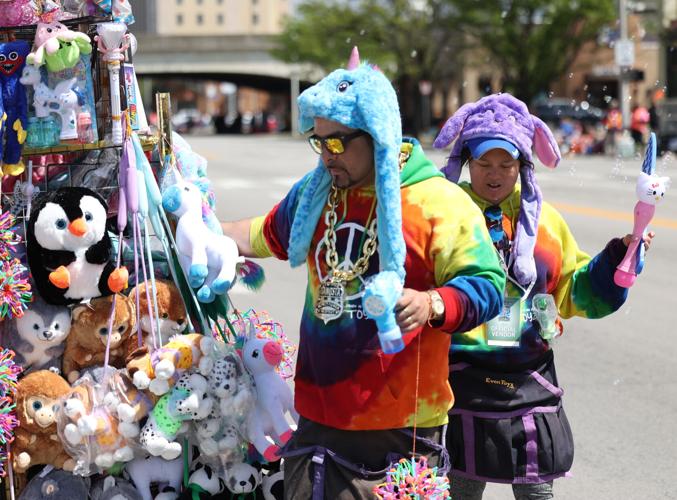 Vendors with stuffed animals at parade.JPG