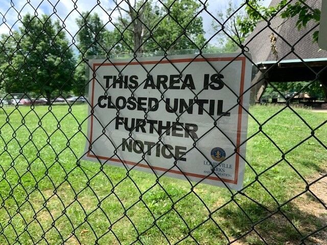 Sign warning that Hogan's Fountain Pavilion in Cherokee Park is closed (in May 2022)