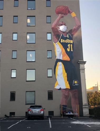 MURAL REGGIE WITH MASK - COURTESY PAMELA BLISS ART.jpg
