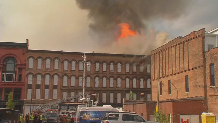 Whiskey Row flames from roof