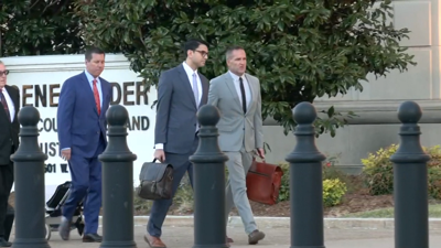 Brett Hankison walks outside federal courthouse in Louisville, Ky.