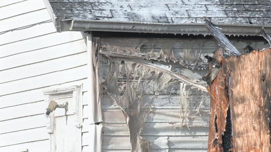 Fire causes extensive damage to structure in Louisville's Portland neighborhood. (WDRB photo)