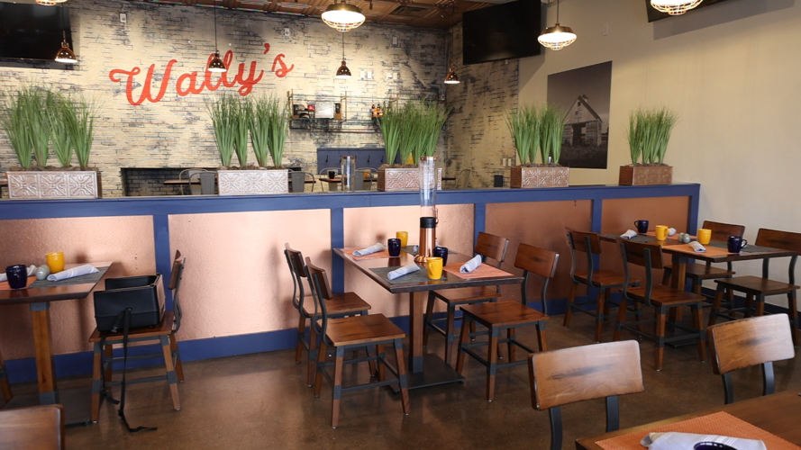 Wally's seating area at restaurant.PNG