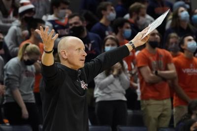 Louisville head coach Chris Mack reacts to a call against Virginia.jpeg