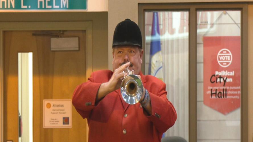 Churchill Downs bugler Steve Buttleman kicks off Junior Achievement of Kentuckiana raffle