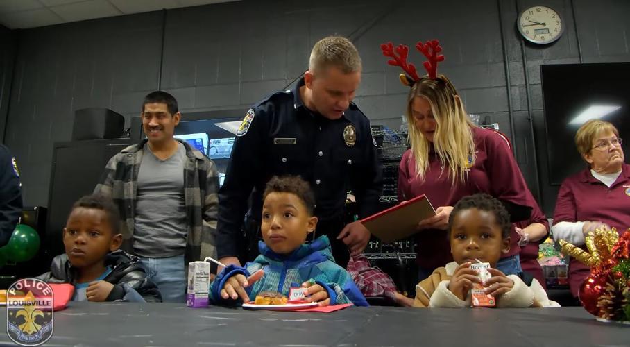 LMPD christmas with a cop photo.JPG