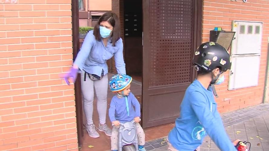 Generic parent with children wearing face masks