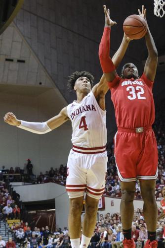 Ohio State forward E.J. Liddell (32) pulls down a rebound in front of Indiana forward Trayce Jackson-Davis