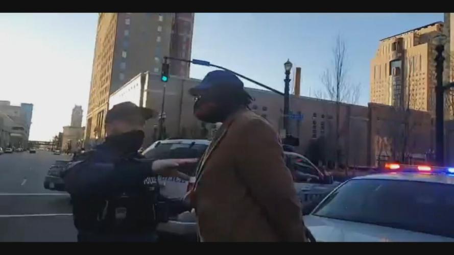Louisville Metro Police arrest Adrien Taylor during a protest
