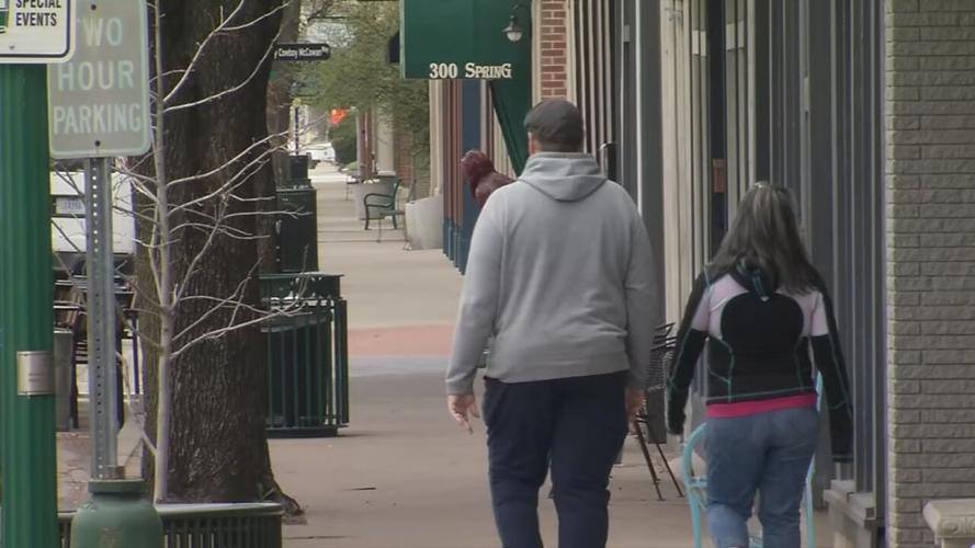 Walkers on Spring Street