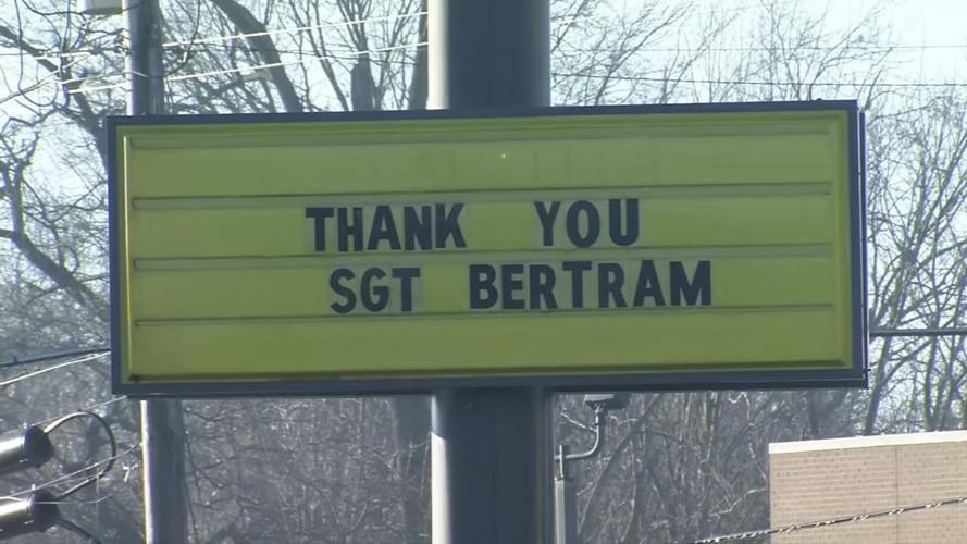Signs honoring Charlestown Police Sgt. Benton Bertram