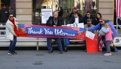 Signs at Veterans Day Parade.JPG