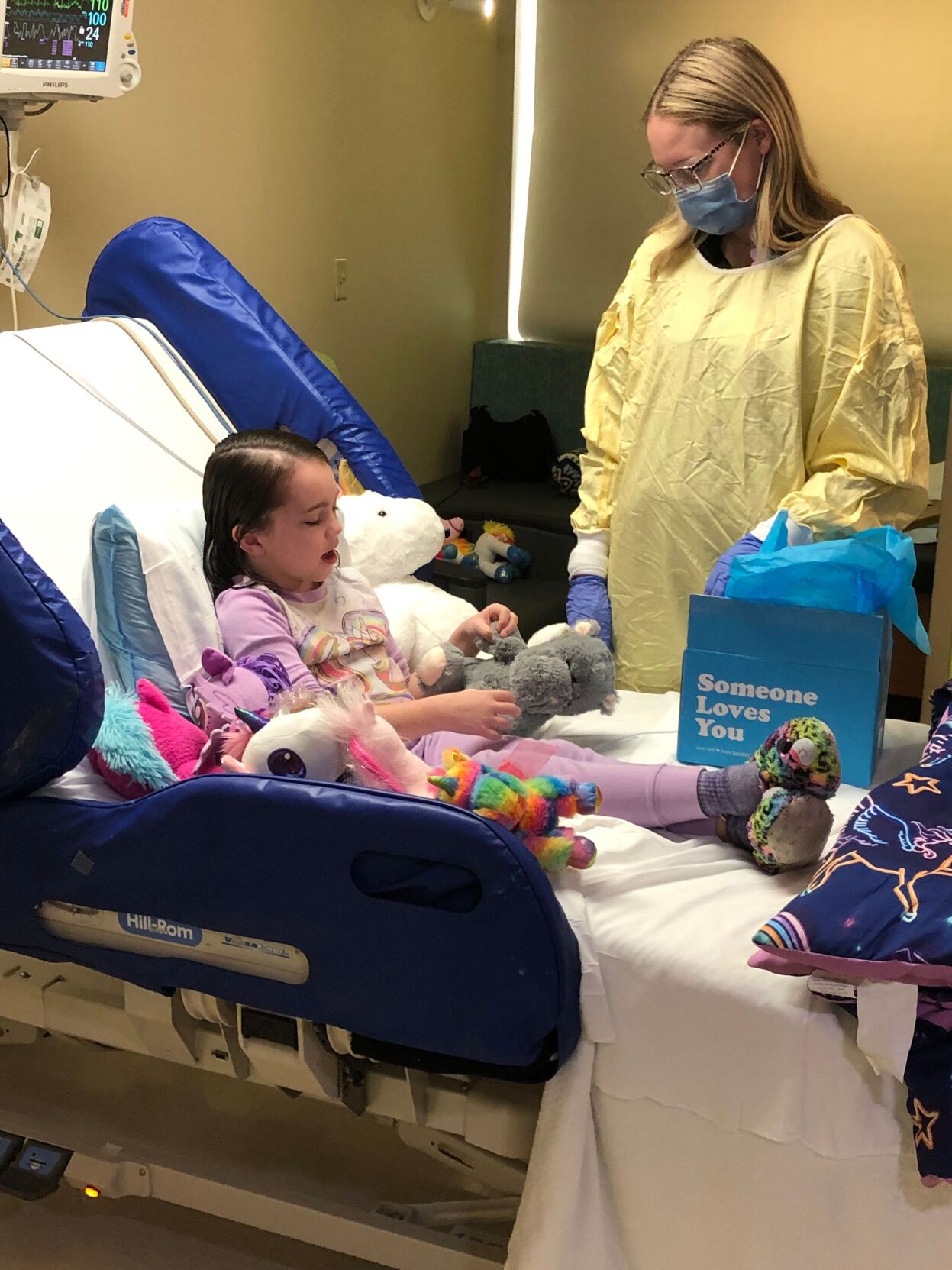 Children receive stuffed animals for Valentine's Day at Norton Healthcare.jpeg