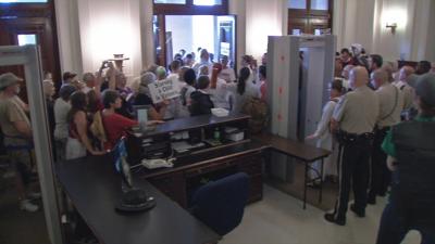Protesters hold brief sit-in at Kentucky Capitol after being denied entrance