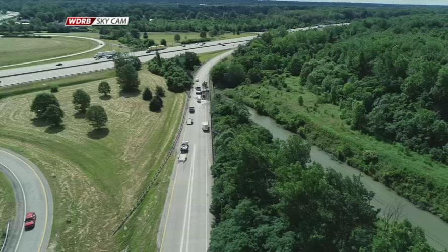 Hole in pavement of ramp to I-65 caused by water erosion